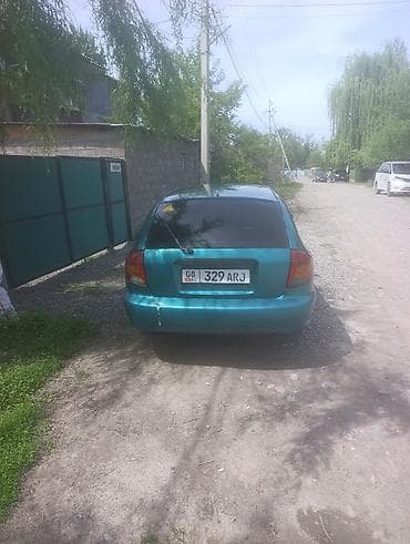 mini ev: Kia Rio: 2003 г., 1.5 л, Механика, Универсал — 4