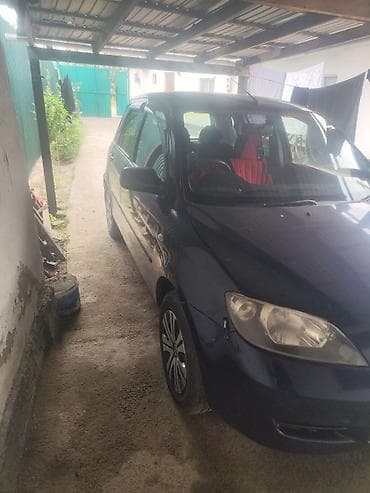 Mazda Demio: 2003 г., 1.3 л, Автомат, Бензин, Хетчбек — 2