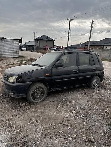 авто чихол: Mazda Demio (первого поколения), черный хэтчбек/универсал 5 дв — 2
