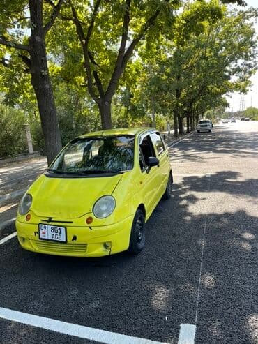 деу матиз 2: Яркий желтый хэтчбек Daewoo Matiz, идеально подходящий для городских — 1