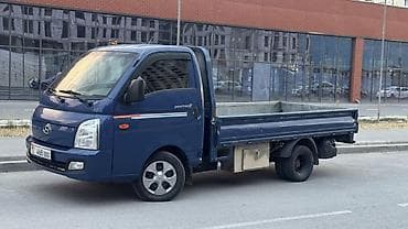 монитор портер 2: Hyundai Porter II, компактный бортовой грузовик в синем цвете — 2