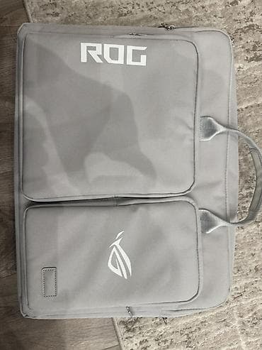 корпус для ноутбука asus: Сумка для ноутбука ROG (серый цвет) - Форм‑фактор: горизонтальная — 1