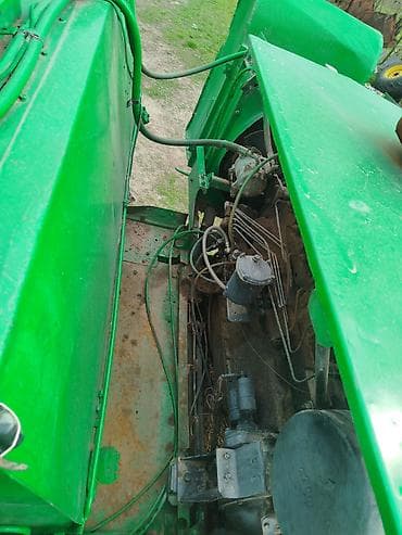 mazda kapella: Зерноуборочный комбайн (самоходный) Описание: - Классическая схема с — 2