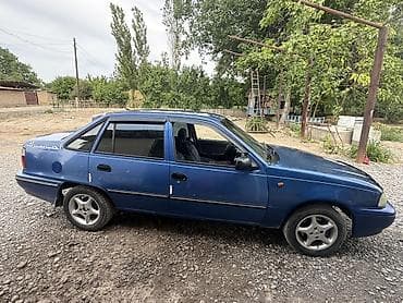 тез арада: Daewoo Nexia: 2008 г., 1.6 л, Кол менен иштөөчү, Бензин, Хетчбек — 4