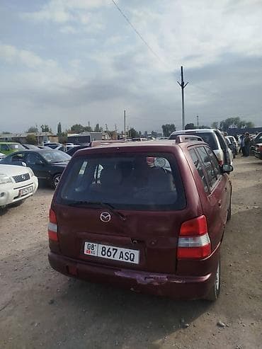 ford c max: Mazda Demio: 1999 г., 1.6 л, Механика, Бензин, Универсал — 1