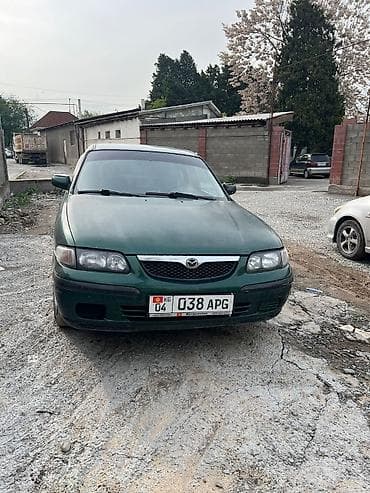 kia stringer: Mazda 626: 1998 г., 2 л, Автомат, Бензин, Седан — 3