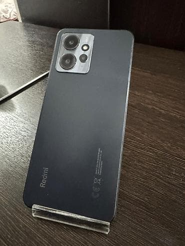 кожаный чехол: Redmi, Redmi 12, Б/у, 128 ГБ, цвет - Черный, 2 SIM — 2