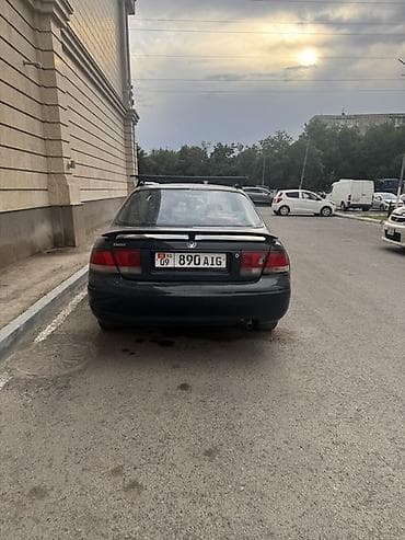 Mazda 626: 1995 г., 1.8 л, Механика, Бензин — 2