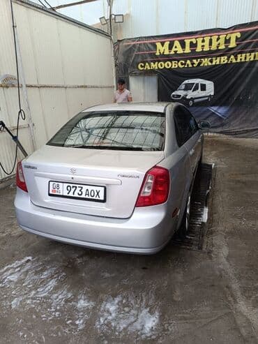 чекол машина: Suzuki Forenza: 2009 г., 2 л, Автомат, Бензин, Седан — 2