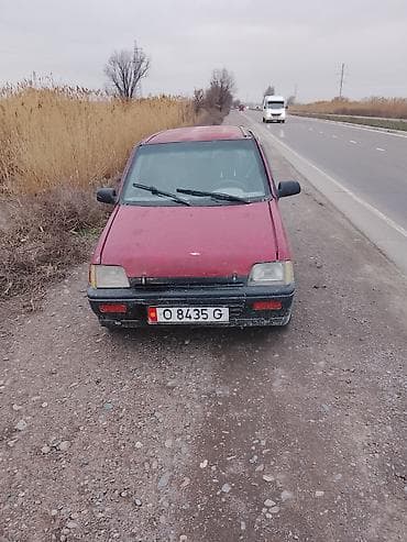 suzuki address: Пятидверный хэтчбек компакт‑класса, красный цвет кузова. Руль левый — 4