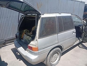 портер 2 салон: Nissan Prairie: 1990 г., Механика, Бензин, Минивэн — 4