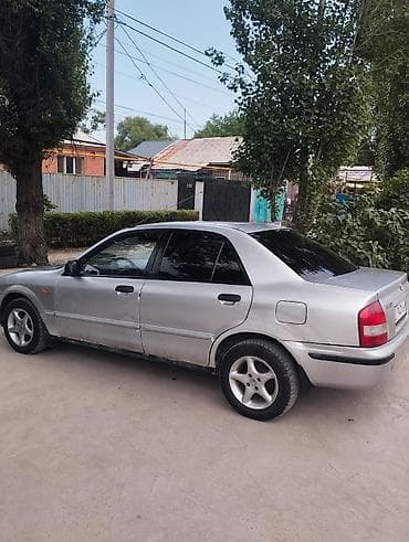 mazda mx5: Mazda 323: 1999 г., Механика, Хэтчбэк — 6