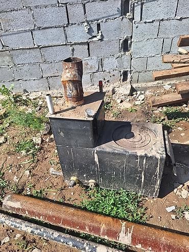 вода буржука: Металлическая печь-буржуйка с варочной поверхностью и водяным — 2