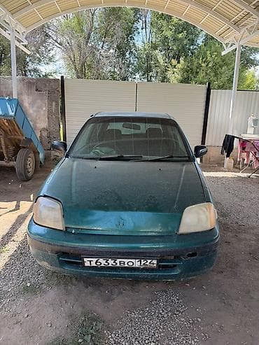 jak авто: Honda Logo: 1998 г., 1.3 л, Вариатор, Бензин, Хэтчбэк — 1