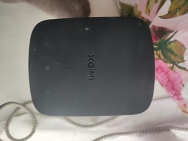 Проекторлор: Проектор XGIMI (серия с акустикой Harman/Kardon) - Компактный — 4