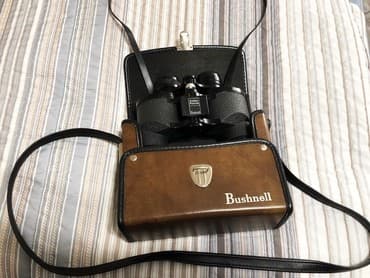 аренда телескоп: Minolta 7x35w. Широкоугольный 9.3° - Nikon zoom action zoom 7-15x35 — 1