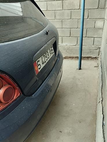 2 gr: Nissan Almera: 2004 г., Ручные, Хэтчбэк — 2