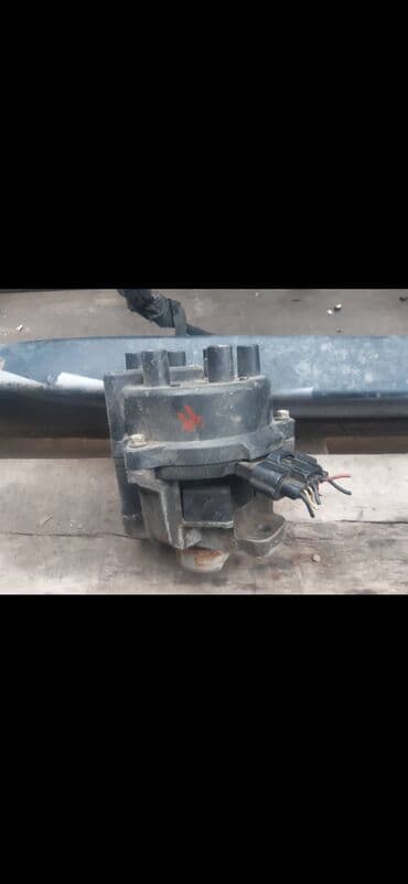 свеча денсо: Трамблер 
Мицубисиге галанд — 1