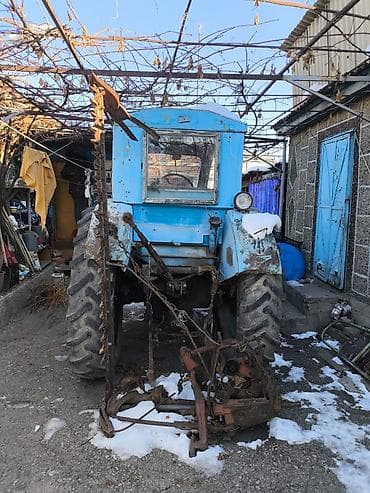 трактор отбойник: Трактор колесный, с кабиной, с навесным оборудованием Описание: - — 3