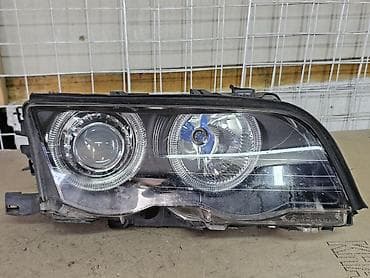 Автозапчасти: Передняя правая фара BMW 2000 г., Б/у — 2