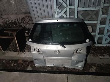 Мазда Демио 2004 до рестайлинг кузовные детали 1.пердедний и