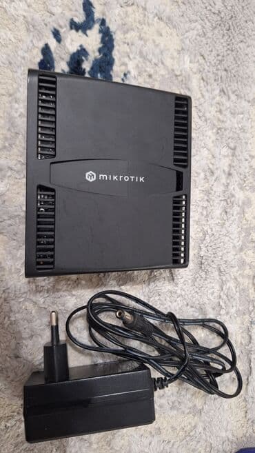 Продам Микротик RouterBoard hAP ax2 (C52iG-5HaxD2HaxD-TC