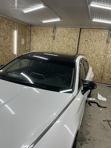 оклейка пленкой: Оклейка крыши автомобиля черной глянцевой пленкой Оклейка черный супер — 2