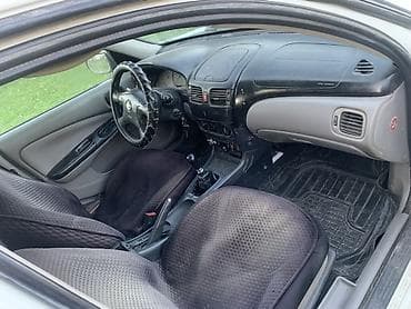 Транспорт: Nissan Almera: 2001 г., 1.5 л, Механика, Бензин, Хэтчбэк — 5