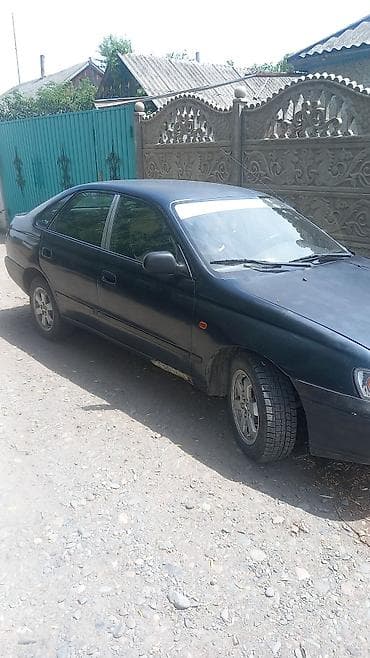портер 2 салон: Toyota Carina: 1994 г., 1.6 л, Механика, Бензин, Хэтчбэк — 6
