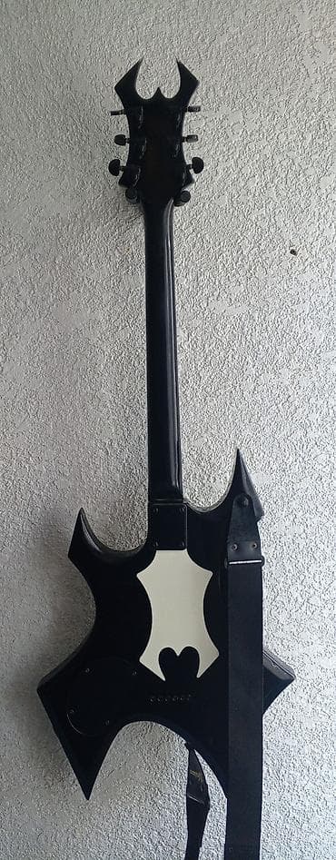 Гитары: Электрогитара в стиле B.C. Rich Warlock - Корпус: остроугольный — 2