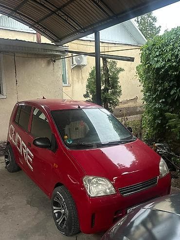 Daihatsu Cuore: 2004 г., 1 л, Механика, Бензин, Хэтчбэк