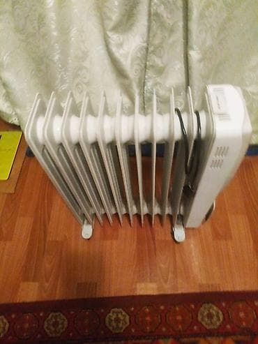 Масляный обогреватель Кол-во секций: 9, Несколько режимов мощности