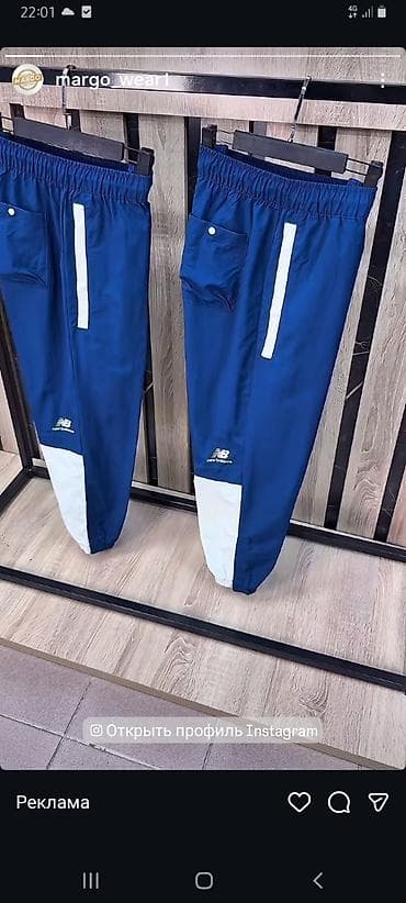 coros pace: Спортивные брюки New Balance, темно-синие с контрастными белыми — 1