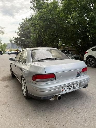 Унаа сатуу: Subaru Impreza: 1994 г., 2 л, Кол менен иштөөчү, Бензин, Седан — 6