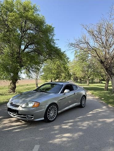 mitsubishi eclipse: Hyundai Tuscani: 2002 г., 2 л, Автомат, Бензин, Купе — 1