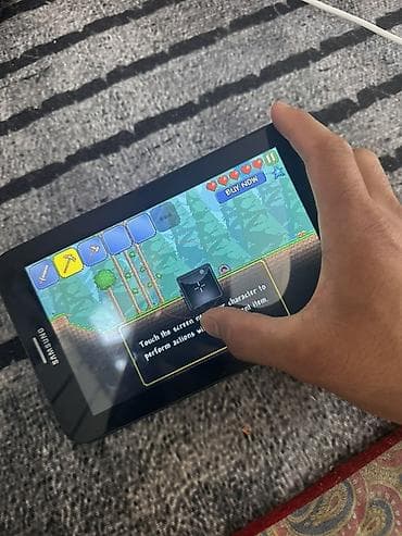 tab 8: Планшет Samsung Galaxy Tab Основные особенности: планшет держит заряд — 1