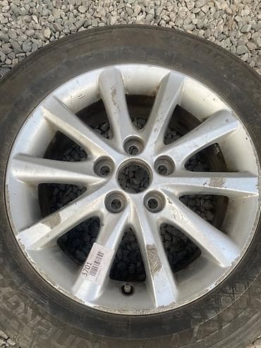 r 16: Литой диск с шиной в сборе. Характеристики: - Диаметр диска: 16" - — 2