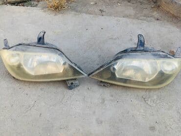 Комплект передних фар Mazda Б/у