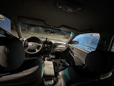 зил 130 дизил: Mazda 626: 2001 г., 2 л, Механика, Бензин, Седан — 5