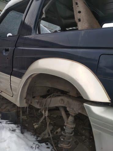 runx alex: Задний левый банан на Митсубиси Паджеро 2 95г. коротыш — 1