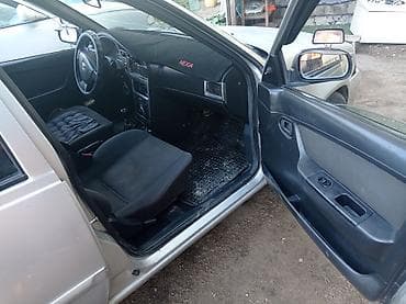 Daewoo Nexia: 2010 г., 1.5 л, Кол менен иштөөчү, Бензин, Седан — 6