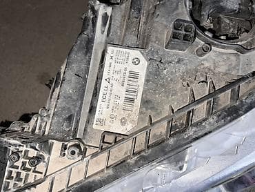 фара 211: Передняя левая фара BMW Оригинал — 2