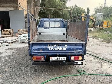 byd e2 2022: Hyundai Porter II, бортовой грузовик с открытой металлической — 4