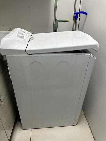 Стиральная машина Hotpoint-Ariston, вертикальная загрузка. Основные