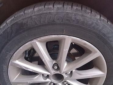 205 75 16: Летние шины Bridgestone 205/60 R16 92H на легкосплавных дисках - — 2
