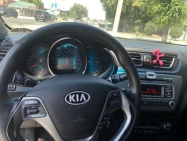 sonata uf: Kia Rio: 2015 г., 1.6 л, Автомат, Бензин, Седан — 4