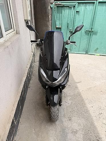 aion v plus: Скутер Wuben (50–125 cc класс) в чёрном цвете. Реальным клиентам — 1
