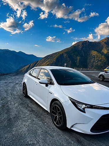 byd e2 2019: Toyota Corolla: 2023 г., 1.8 л, Вариатор, Гибрид, Седан — 4