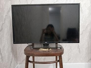 lg тв: Телевизор TCL, диагональ ориентировочно 32" (80 см). Плоская — 1
