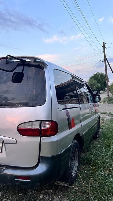 Унаа: Hyundai Starex: 2004 г., 2.6 л, Кол менен иштөөчү, Дизель, Вэн/Минивэн — 10